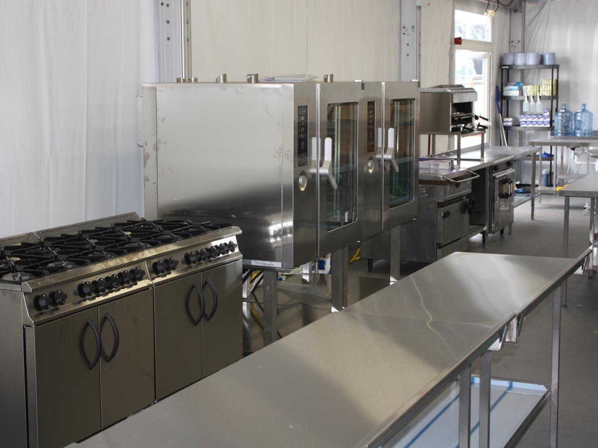A shot of a marquee kitchen interior. One of 22 installations for the London Olympics.